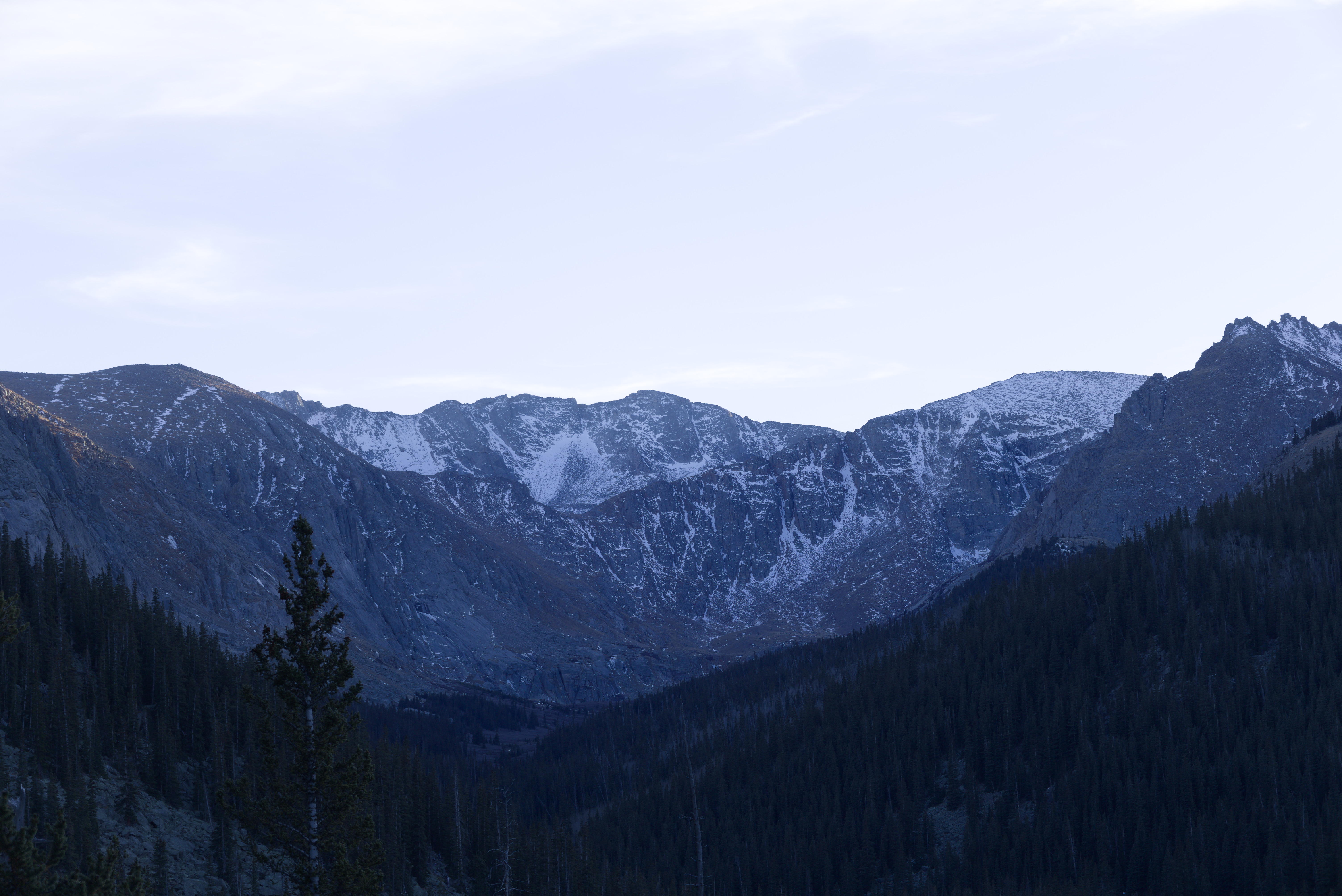 Colorado mountains at golden hour with dramatic clouds